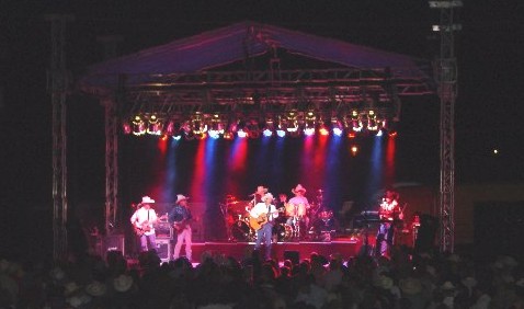 Chris LeDoux concert 2004 — outdoor stage with Tradewind truss roof and lighting